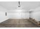 Spacious two car garage with white walls and an automatic garage door opener at 2401 E Rio Salado Pkwy # 1055, Tempe, AZ 85288