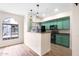 Bright kitchen features updated cabinets, modern appliances, and breakfast bar at 2401 E Rio Salado Pkwy # 1055, Tempe, AZ 85288