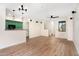 A bright and open living room with modern lighting fixtures, and ceiling fan at 2401 E Rio Salado Pkwy # 1055, Tempe, AZ 85288