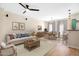 A stylish living room with a dining table, sofa, and an open floor plan at 2401 E Rio Salado Pkwy # 1055, Tempe, AZ 85288