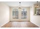 Bright living space featuring arched windows with views, and pendant lighting at 2401 E Rio Salado Pkwy # 1055, Tempe, AZ 85288