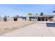 Large backyard with patio, block wall, and ample space for outdoor activities at 2715 E Edgemont Ave, Phoenix, AZ 85008