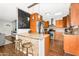 Bright, open kitchen featuring granite countertops, stainless appliances and custom cabinetry at 2715 E Edgemont Ave, Phoenix, AZ 85008