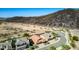 Desert community featuring single-story homes with desert landscaping, tile roofs, and attached garages with desert mountain views at 3028 W Parkside Ln, Phoenix, AZ 85027