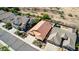 Single-level home with desert landscaping, a tile roof, and a two-car garage sits in a desert community with pools at 3028 W Parkside Ln, Phoenix, AZ 85027