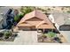 Single-story home with desert landscaping, tile roof, and a spacious driveway leading to an attached two-car garage at 3028 W Parkside Ln, Phoenix, AZ 85027