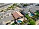 Home featuring a private backyard with a freeform pool, covered patio, and low maintenance desert landscape at 3028 W Parkside Ln, Phoenix, AZ 85027