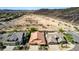 Desert community living with single-story homes, desert landscaping, tile roofs, and attached garages. Desert terrain in background at 3028 W Parkside Ln, Phoenix, AZ 85027