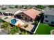 Desert home with a private backyard featuring a freeform pool, covered patio, and easy-care desert landscaping at 3028 W Parkside Ln, Phoenix, AZ 85027