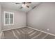 Bedroom featuring neutral paint, carpeted floors, and a window with shutters at 3028 W Parkside Ln, Phoenix, AZ 85027