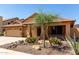 Charming single-story home featuring a three-car garage and drought-tolerant landscaping at 3028 W Parkside Ln, Phoenix, AZ 85027
