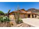 Charming single-story home featuring a three-car garage and drought-tolerant landscaping at 3028 W Parkside Ln, Phoenix, AZ 85027