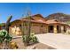 Charming single-story home featuring a three-car garage and drought-tolerant landscaping at 3028 W Parkside Ln, Phoenix, AZ 85027