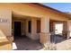 Inviting front porch with decorative columns on a beige home with dark trim at 3028 W Parkside Ln, Phoenix, AZ 85027
