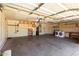 Spacious garage with laundry hookups, water heater, shelving, and garage door at 3028 W Parkside Ln, Phoenix, AZ 85027