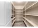 Walk-in pantry with ample shelving for organized storage at 3028 W Parkside Ln, Phoenix, AZ 85027