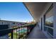 Apartment balcony view of landscaped common areas and a sparkling community pool at 3230 E Pinchot Ave # 32, Phoenix, AZ 85018