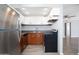 Modern kitchen featuring stainless steel appliances, updated countertops, and ample cabinet space at 3230 E Pinchot Ave # 32, Phoenix, AZ 85018