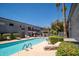 Inviting pool area with ample lounge chairs and tables, perfect for relaxation at 3230 E Pinchot Ave # 32, Phoenix, AZ 85018