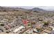 Scenic aerial view of homes surrounded by desert landscape and mountains in the distance at 327 E Monte Way, Phoenix, AZ 85042