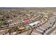 Sweeping aerial perspective of a tranquil residential area showcasing lush backyard landscaping and swimming pools at 327 E Monte Way, Phoenix, AZ 85042