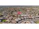 High-angle aerial view of a peaceful neighborhood featuring well-maintained homes and neatly arranged streets at 327 E Monte Way, Phoenix, AZ 85042
