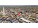 Overhead aerial view highlighting a community with manicured lawns, private pools, and tidy rooflines at 327 E Monte Way, Phoenix, AZ 85042