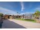 Enjoy outdoor living in this backyard with a trampoline and ample room to relax and entertain at 327 E Monte Way, Phoenix, AZ 85042