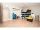 Bedroom featuring wood laminate flooring and a walk-in closet at 327 E Monte Way, Phoenix, AZ 85042