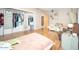 Bedroom with hardwood floors, a walk-in closet, and a ceiling fan at 327 E Monte Way, Phoenix, AZ 85042
