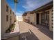 Private courtyard with drought resistant landscaping and covered patio furniture at 327 E Monte Way, Phoenix, AZ 85042