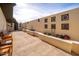 Spacious courtyard featuring decorative brickwork, seating, and a private entrance, creating a unique outdoor living space at 327 E Monte Way, Phoenix, AZ 85042