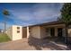 Well-maintained desert landscape featuring a block wall and low-water landscaping at 327 E Monte Way, Phoenix, AZ 85042