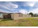 Expansive front yard with low water landscaping, block wall and mature trees at 327 E Monte Way, Phoenix, AZ 85042