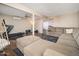 The home features a spacious living room with ample room for activities and a seating area at 327 E Monte Way, Phoenix, AZ 85042