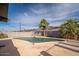 Sparkling pool surrounded by lush landscaping offers a private and refreshing outdoor retreat at 327 E Monte Way, Phoenix, AZ 85042