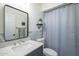 Bathroom featuring stylish vanity with marble countertop and patterned tile accents, creating a serene and modern space at 3362 E Carol Ave, Mesa, AZ 85204