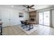 Dining area featuring a brick fireplace and sliding glass doors to the patio at 3362 E Carol Ave, Mesa, AZ 85204