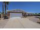 Charming home featuring a two-car garage, desert landscaping and a brick exterior at 3362 E Carol Ave, Mesa, AZ 85204