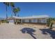 Well-maintained one-story home with a two-car garage and desert landscaping at 3362 E Carol Ave, Mesa, AZ 85204