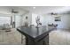 Spacious living area with tile flooring, multiple seating areas, and neutral tones creating an inviting atmosphere at 3362 E Carol Ave, Mesa, AZ 85204