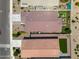 Aerial view of residential homes showcasing backyard patio and green grass, providing a neighborhood perspective at 36515 N Takota Trl, San Tan Valley, AZ 85140