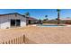 Inviting backyard featuring a refreshing pool, patio area, and mature landscaping around the pool at 3765 W Wood Dr, Phoenix, AZ 85029