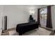 Minimal bedroom with wood floors, and light fixtures at 3765 W Wood Dr, Phoenix, AZ 85029