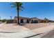 Lovely single-story home featuring desert landscaping, manicured lawn, and a two-car garage at 3765 W Wood Dr, Phoenix, AZ 85029