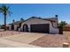 Charming single-story home with a well-maintained front yard and a two-car garage at 3765 W Wood Dr, Phoenix, AZ 85029