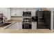 Close-up of modern kitchen with stainless steel appliances, ample counter space, and stylish cabinets at 3765 W Wood Dr, Phoenix, AZ 85029