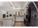 Bright kitchen featuring stainless steel appliances, ample cabinet space, and neutral countertops at 3765 W Wood Dr, Phoenix, AZ 85029