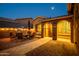 Enchanting courtyard with a beautiful brick patio, offering a perfect space for evening gatherings and relaxation at 42311 W Good Vibrations Ln, Maricopa, AZ 85138