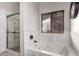 Bathroom features a jacuzzi tub and a glass door shower at 424 S 2Nd St # 306, Phoenix, AZ 85004